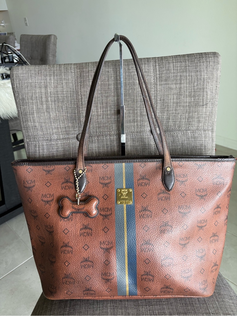 MCM Choco Brown tote with bone charm